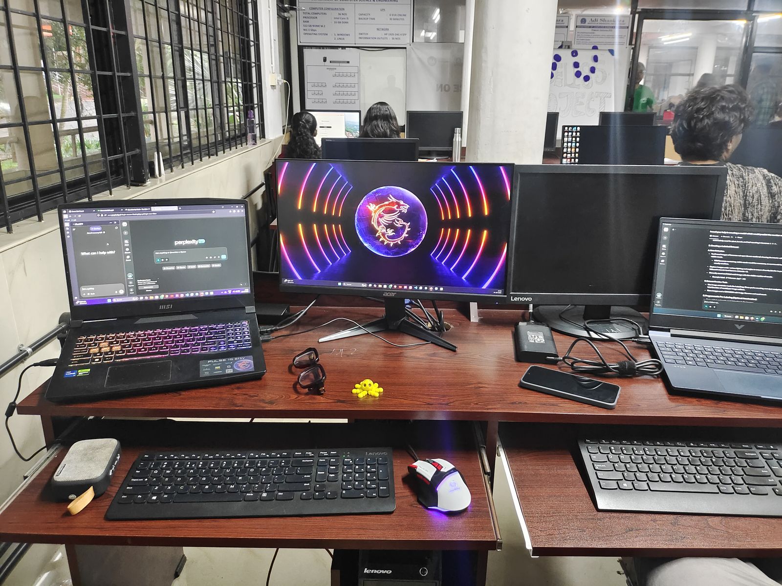 The desk where it all happened — TinkerHub hackathon night.